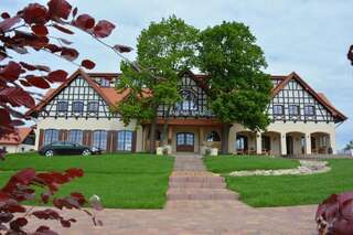 Фото Отель Hotel Kuźnia Smaków г. Małe Pułkowo